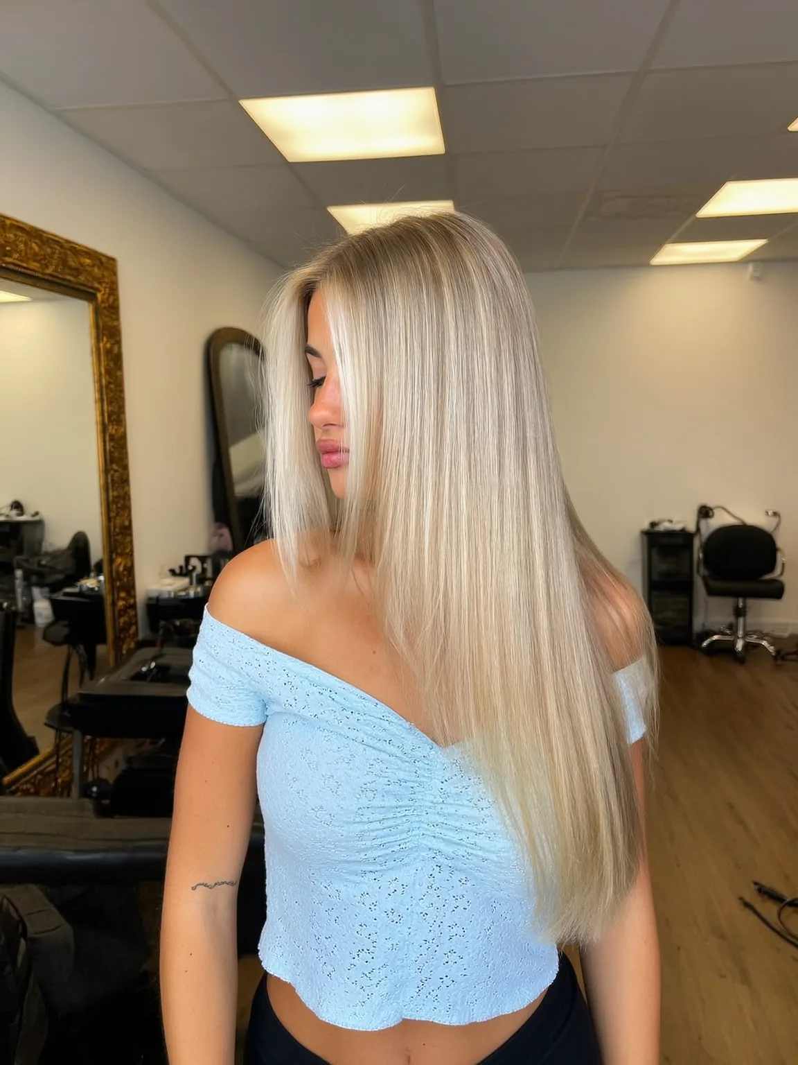Sleek Long Platinum Blonde Blunt Cut